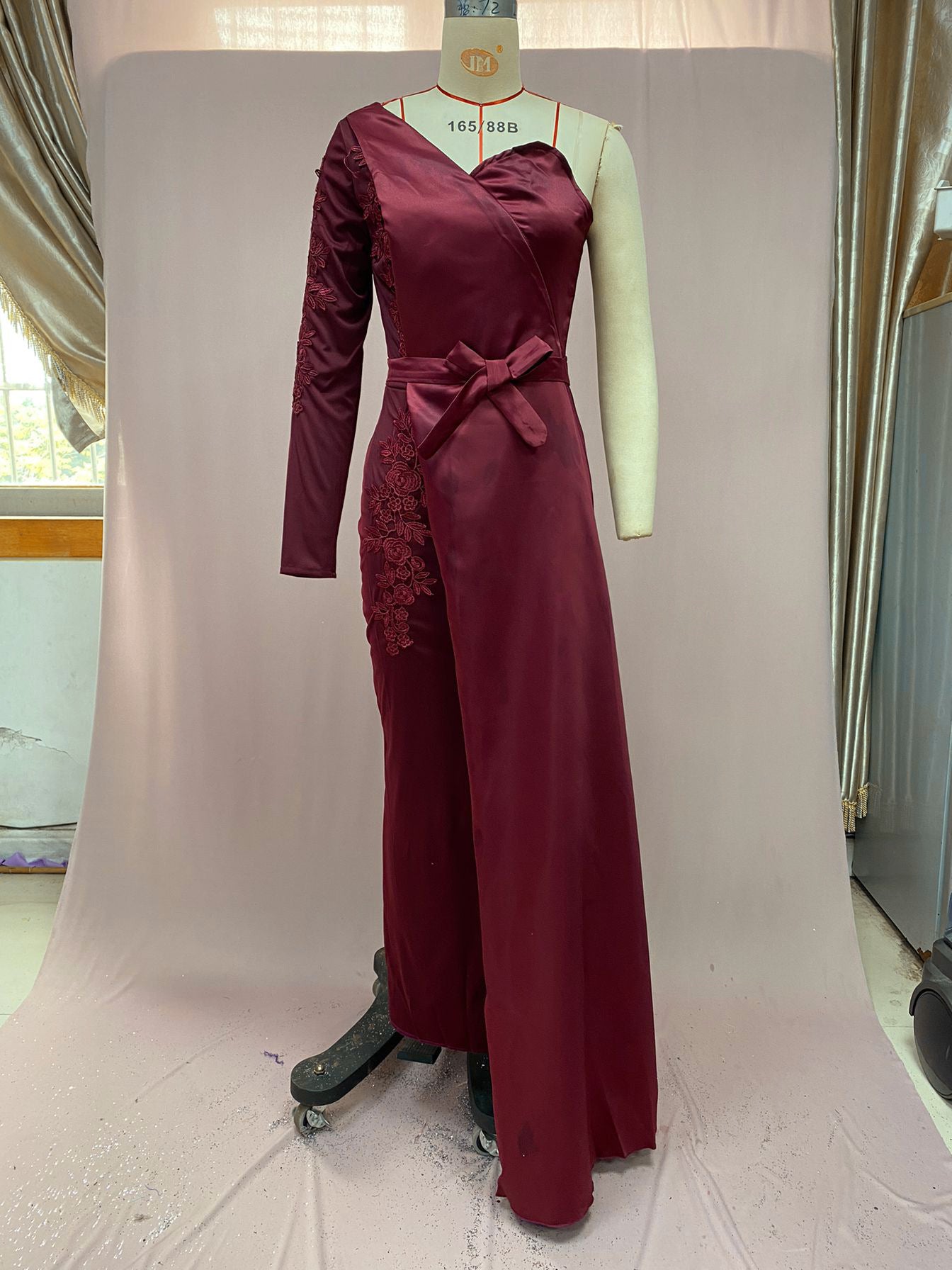 Wine One-Shoulder Evening Gown – Elegant Draped Design with Embellished Lace Detailing