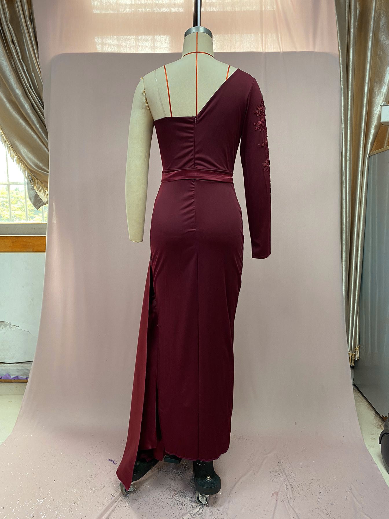 Wine One-Shoulder Evening Gown – Elegant Draped Design with Embellished Lace Detailing